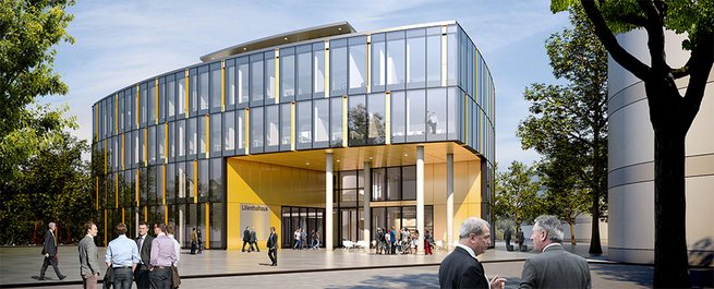 Modernes, gebogenes Bürogebäude mit Glasfassade und gelbem Eingangsbereich "Lilienthalhaus", Menschen vor dem Eingang.